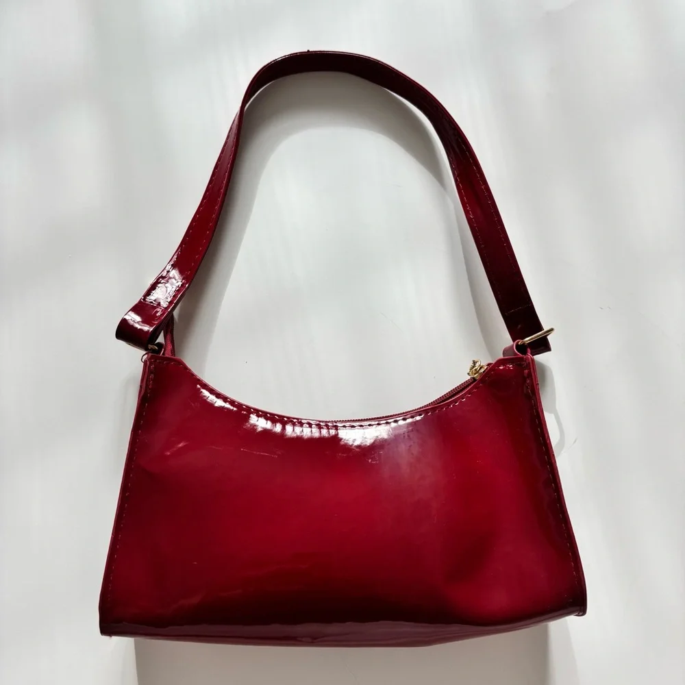 burgundy shoulder bag with gold zipper
